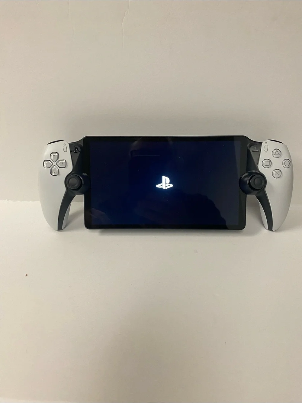 Sony PlayStation Portable-style Handheld with White Side Controllers